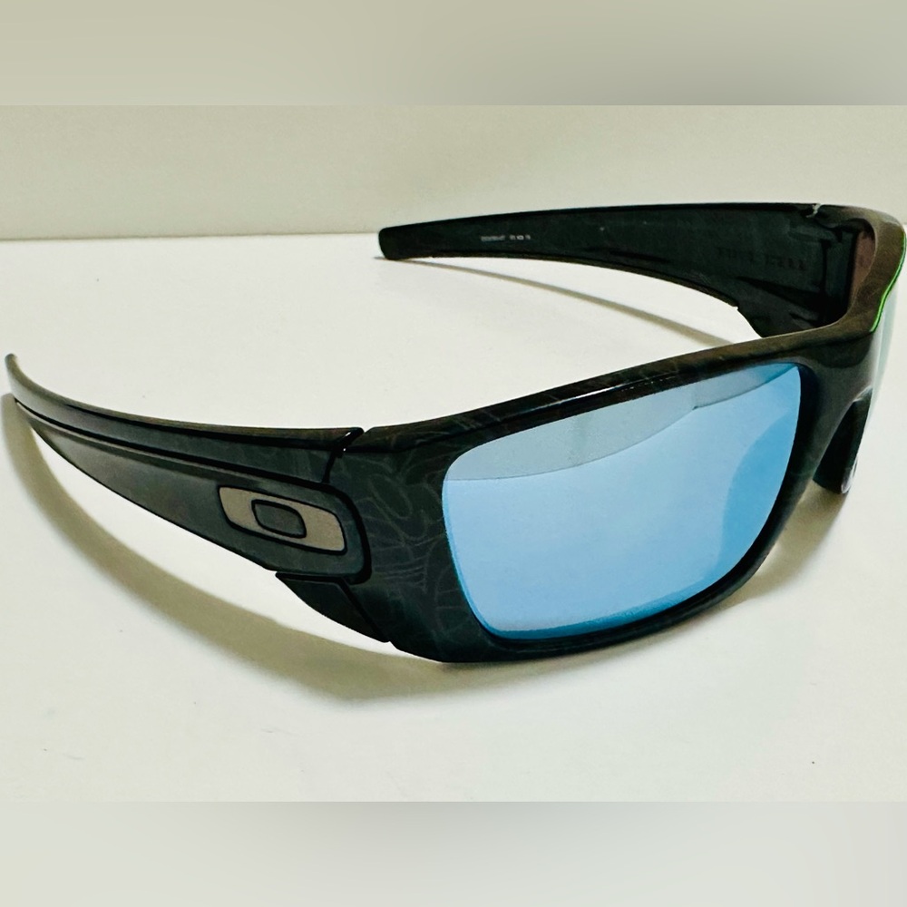 Brand New Authentic Oakley Fuel Cell Black Ghost Text/Deep Water Prizm Polarized